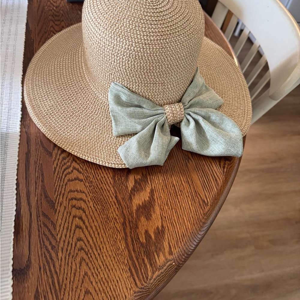 Stylish Tan Straw Hat with Green Bow